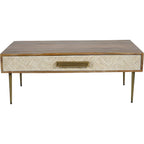 Front view of the coffee table showing the full chevron drawer panel, central rectangular gold-toned handle and tapered legs.