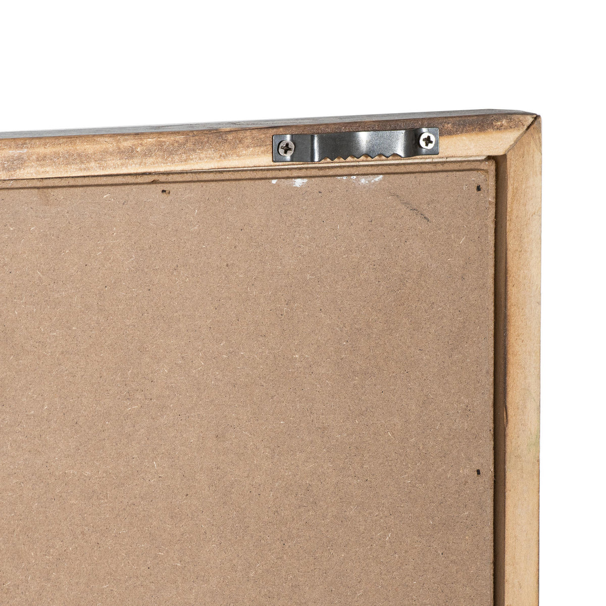 Rear corner of the plaque showing a brown backing, angled frame corner and a silver-coloured toothed bracket secured by two screws.