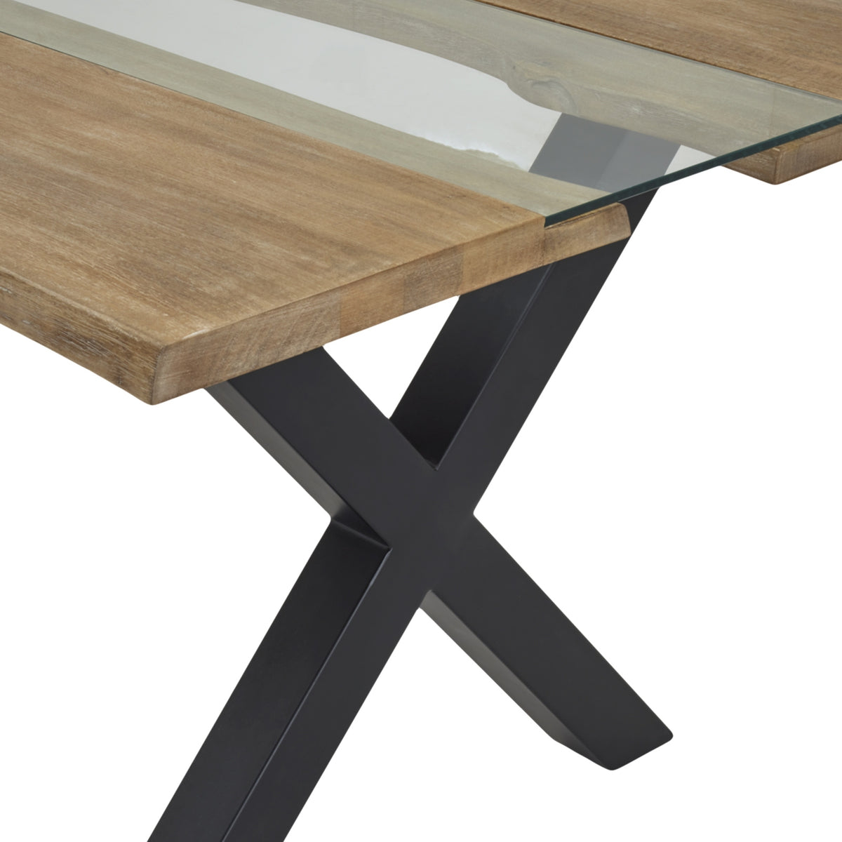 Close view of a tabletop corner, showing pale grain markings beside the transparent panel and a black X-shaped support below.