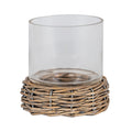 Clear open cylinder resting on a low round brown woven tray, shown against a white background.