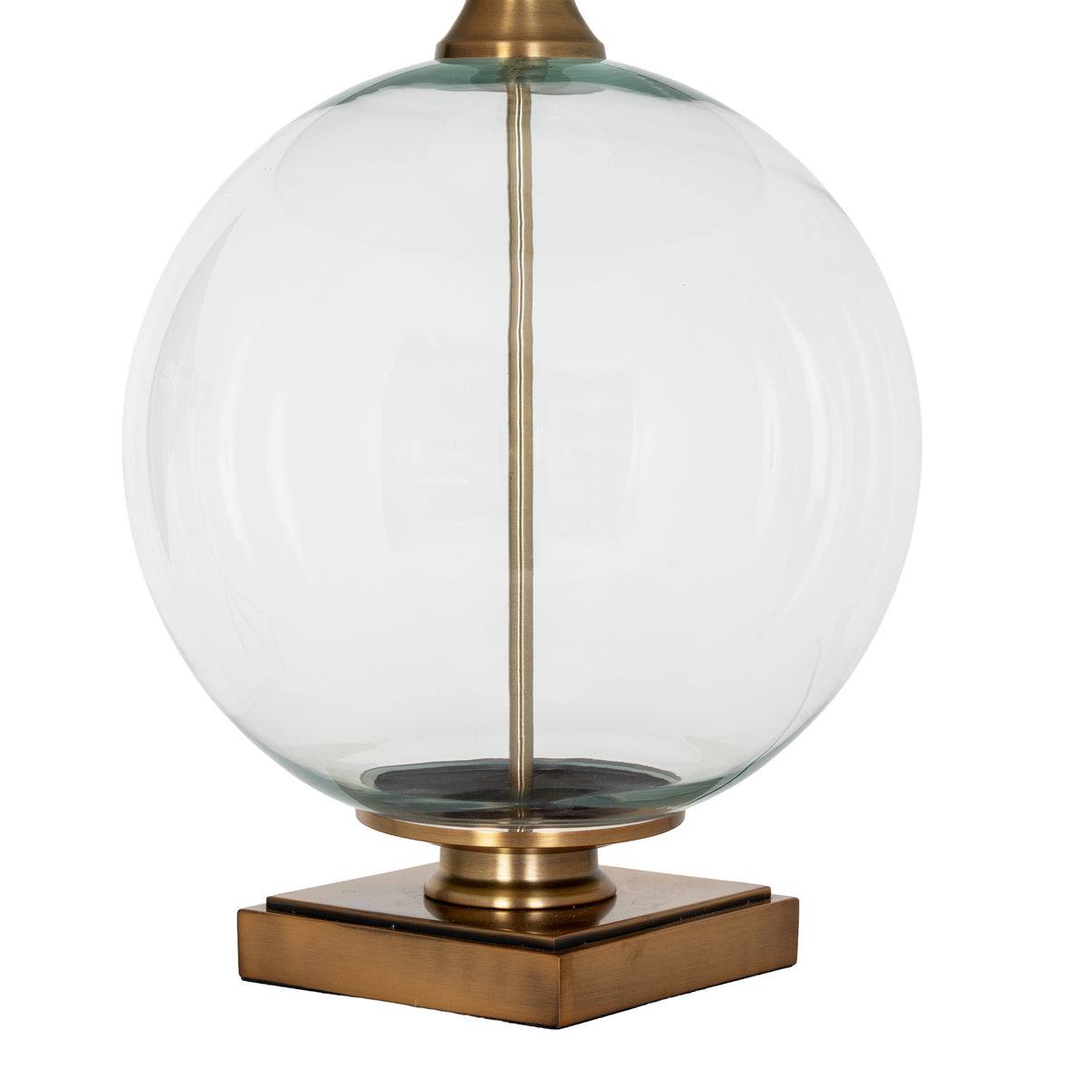 Close-up of the lamp's clear spherical body, showing the slender brass-toned central support and stepped square base.