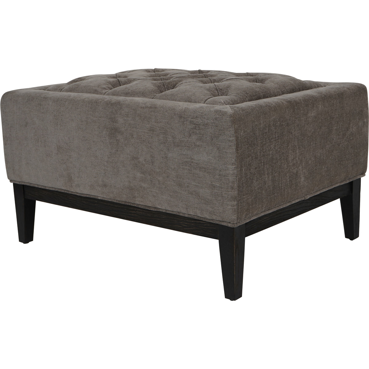 Angled view of the grey upholstered footstool showing its padded sides, exposed wooden rails and tapered legs.