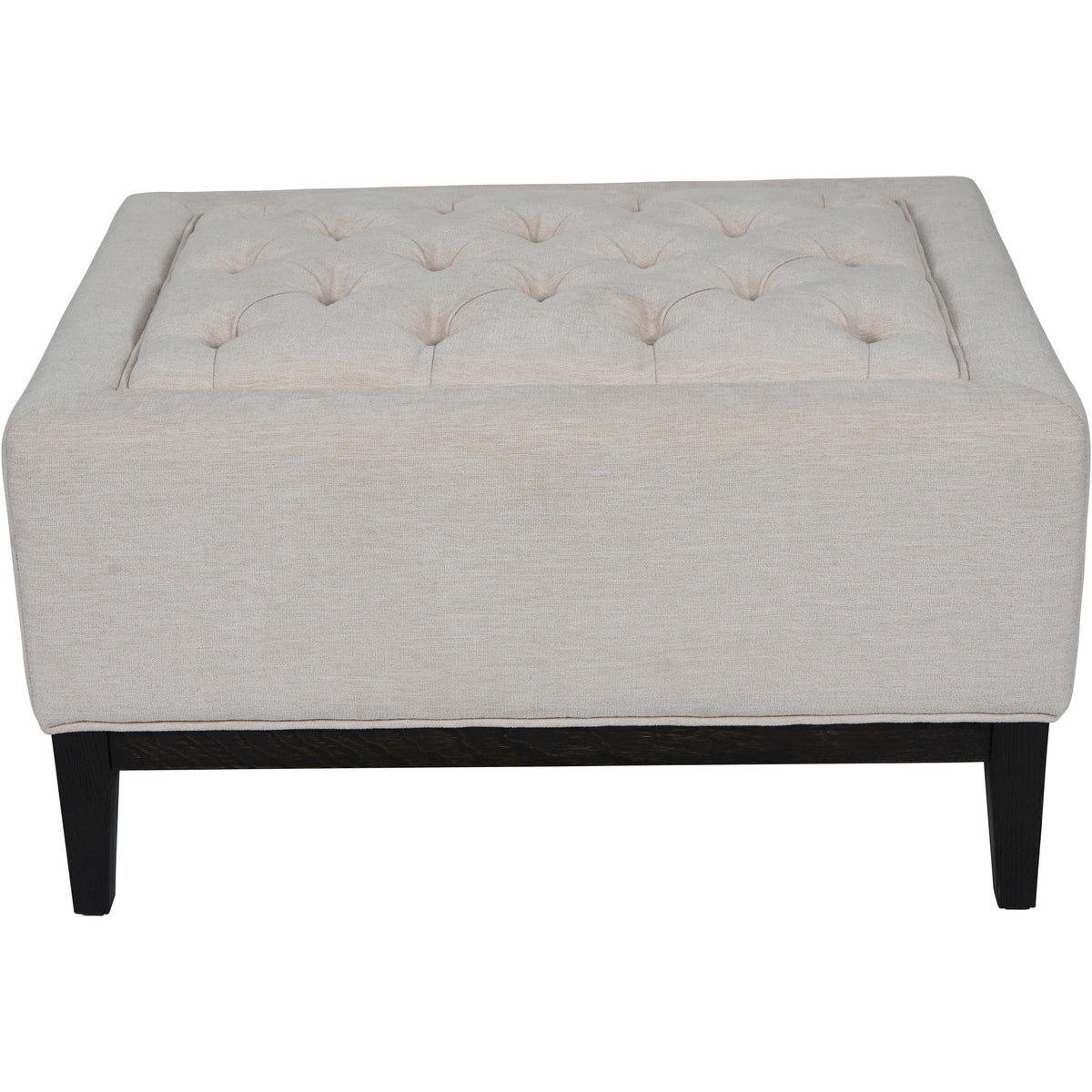 Front view of the ivory upholstered footstool, showing its buttoned inset top, dark wooden base rail and tapered legs.