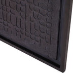 Angled close-up of the lower corner showing the dark cobbled relief, black backing border and frame.