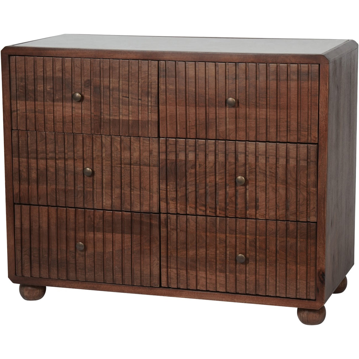 Angled view of the dark brown Coffer Chest with six ridged drawers, brass knobs, pale inset top and rounded feet.