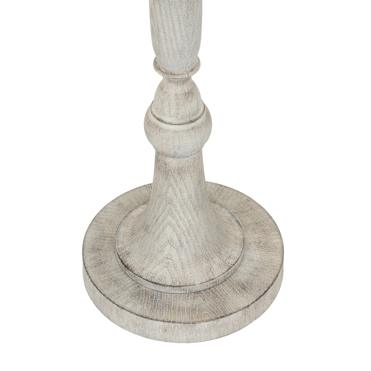 Close-up of the lamp's shaped lower stem and circular stepped foot, showing a pale grain-like pattern and darker contour lines.