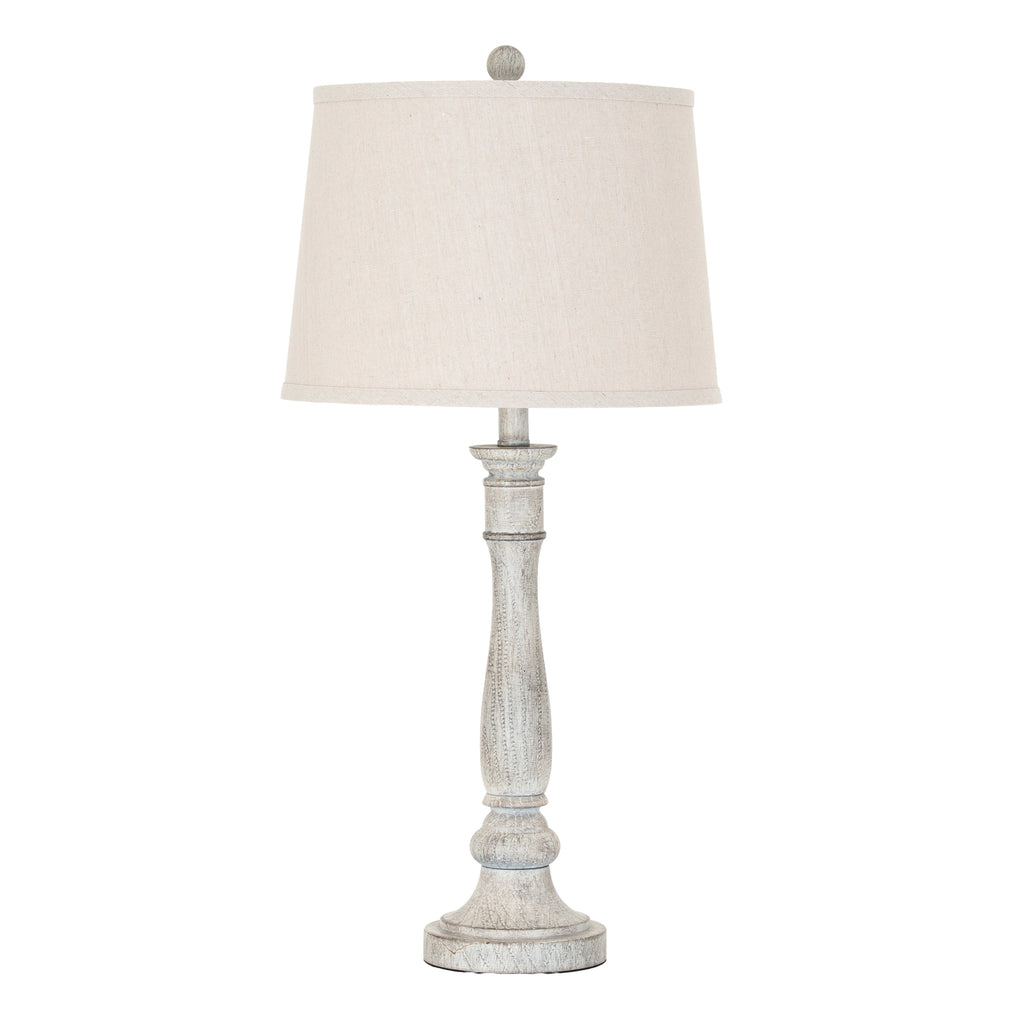 Collar Stem Table Lamp with a pale tapered drum shade, round finial and textured grey-beige column on a circular foot.