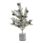 Full view of a miniature green tree with brown cone shapes, snowy white branches and a cylindrical bark-textured base.
