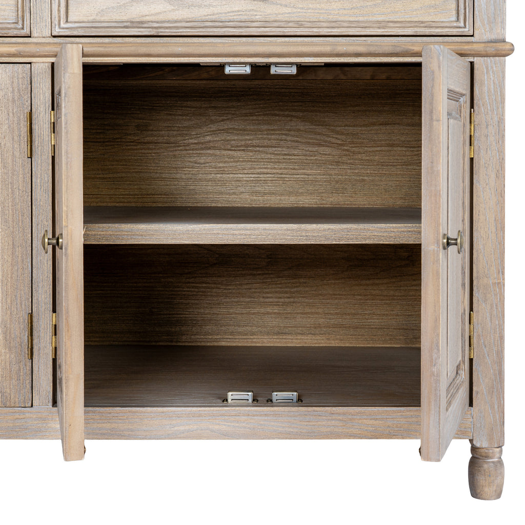 Two lower cupboard doors open to reveal a single shelf dividing two empty compartments, with hinges and silver-coloured fittings visible.
