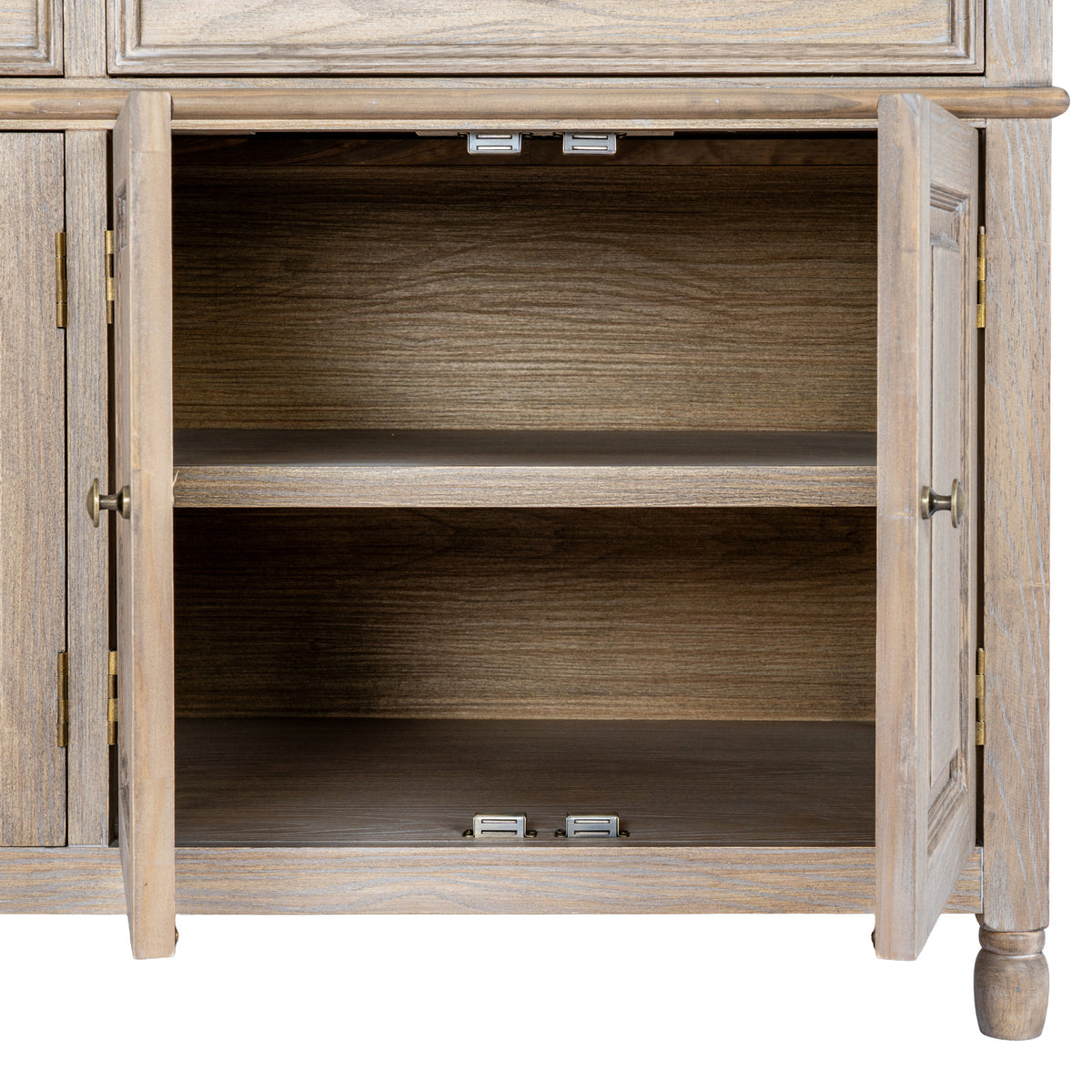Two lower cupboard doors open to reveal a single shelf dividing two empty compartments, with hinges and silver-coloured fittings visible.