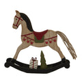 Side view of a pale rocking-horse decoration with red bridle and saddle details, a green saddle panel, cord tail and dark rockers, with small tree and present details beneath the horse.