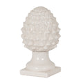 Off-white acorn ornament with an oval scale-covered crown, flared pedestal and square foot against a white background.