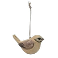 Cream-beige bird hanging decoration facing right, with a raised tail, grey-brown incised wing markings, dark eye detailing and a long grey cord against white.