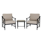 Front view of two black armchairs with beige seat and back cushions, arranged either side of a pale-topped table.