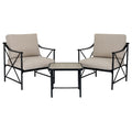Two beige-cushioned black armchairs angled towards a square table, with crossed side braces visible.