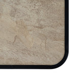Close detail of the table top's beige and brown mottled pattern beside a rounded black corner.
