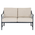 Front view of the bench with two beige back cushions above matching seat cushions and slim black legs.