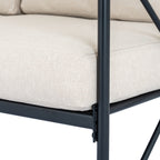 Close view of a beige seat cushion's fine woven texture and stitched edge beside a black frame post.