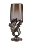 Front view of the Curl Base Hurricane with tall smoked glass above a bronze-toned curling base and round foot.