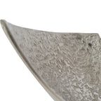Close-up of the bowl's textured silver-coloured interior and curved upper edge.