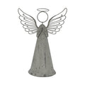 Front view of a weathered grey standing angel with folded hands, a long conical robe, circular head and halo, and broad wings with curled outlines.