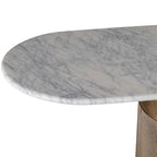 Close-up of the marble top's rounded end, showing grey veining across the pale surface and edge.