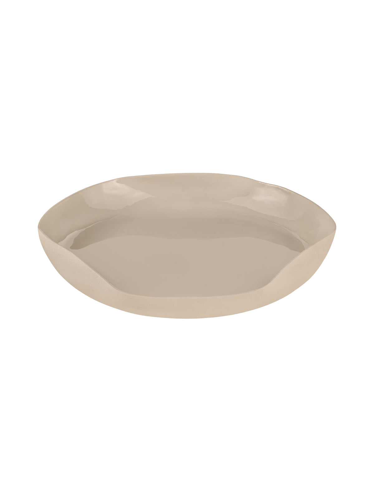 Cream decorative tray viewed at an angle, showing its irregular outline and glossy interior.
