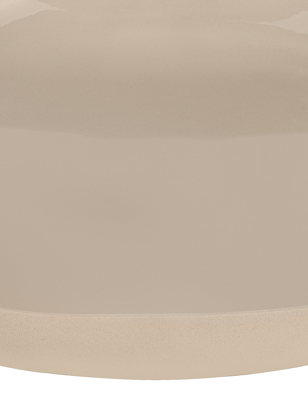 Detail of the tray's cream interior and finely textured outer rim.