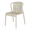 Three-quarter front view of the putty dining chair, showing six slats curving into the seat and four legs.