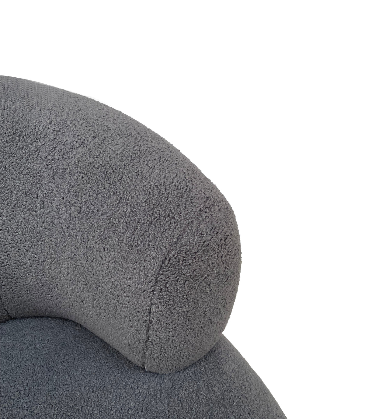 Close-up of the chair's curved back showing the grey bouclé texture and stitched seam.