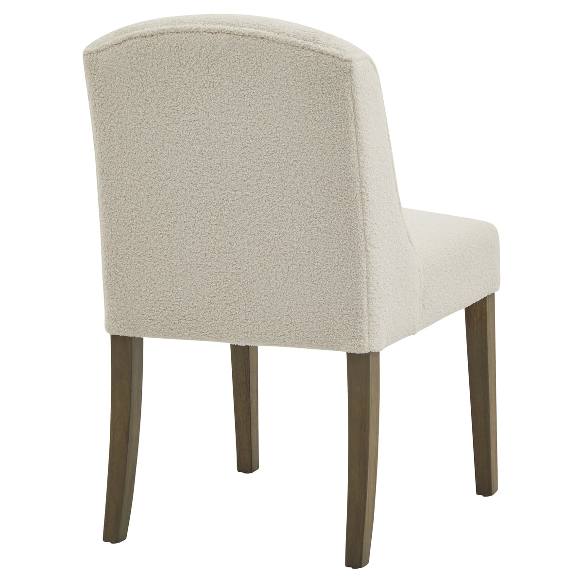 Rear angled view of the dining chair showing its cream textured back, curved top edge and brown legs.