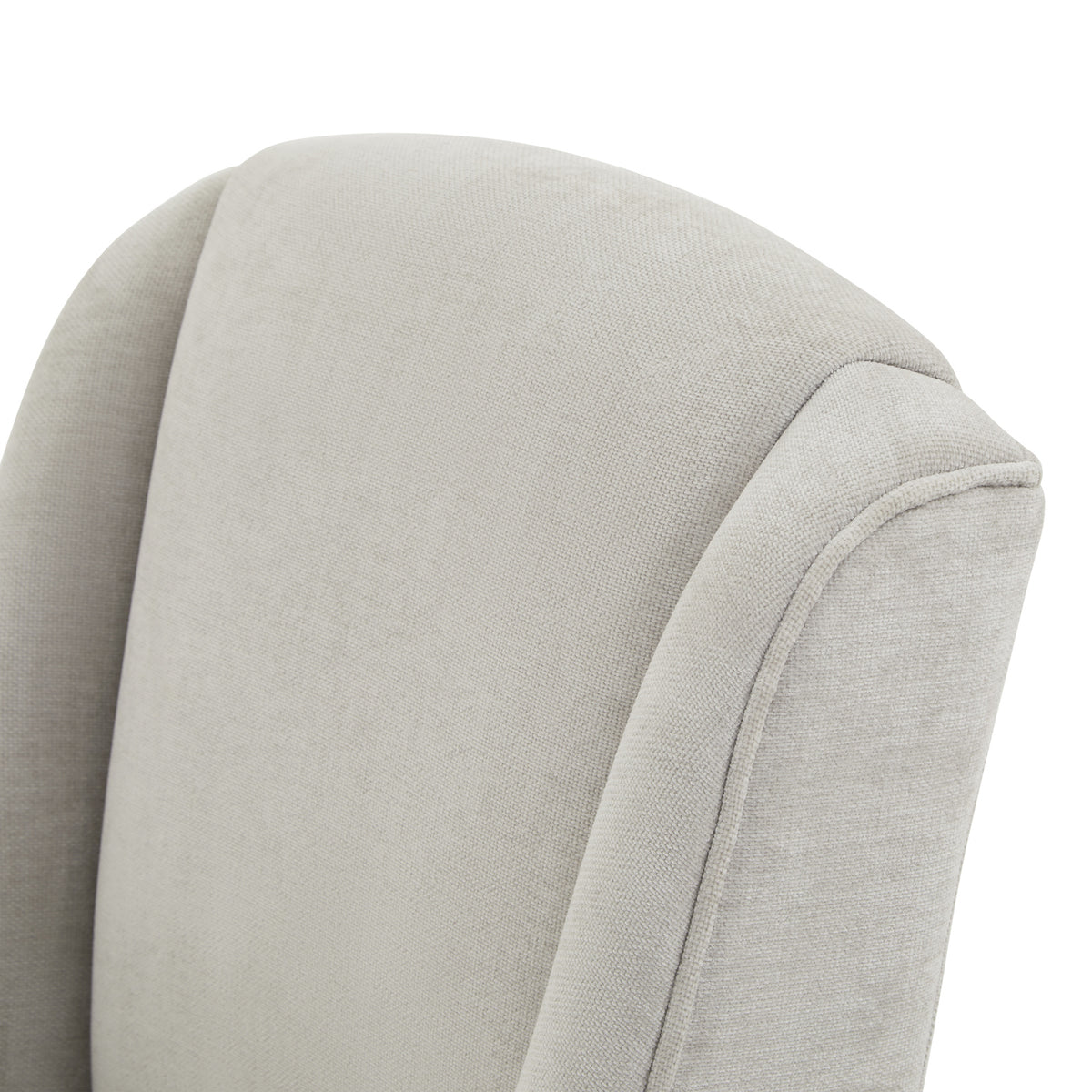 Close-up of the pale grey chair back showing its fine woven appearance, curved side wing and piped outer edge.