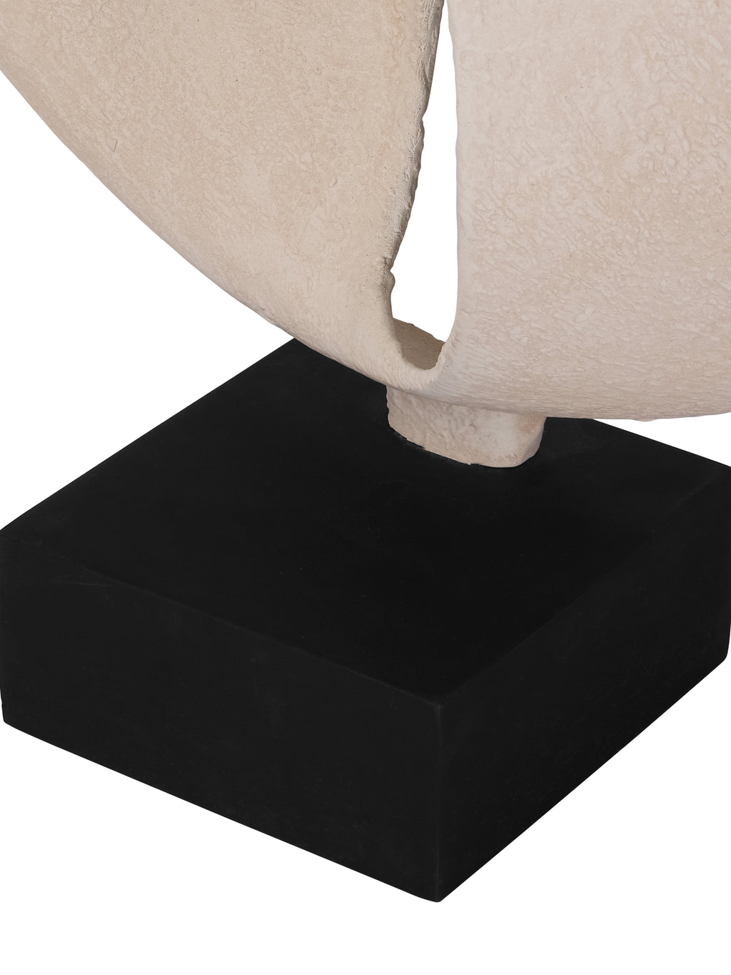 Detail of the sculpture's lower opening and cream stem meeting the black rectangular base.