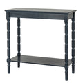 Dark charcoal-black console table on a white background, showing its rectangular top, plain apron, four turned-profile legs and lower shelf.