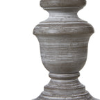 Close-up of the lamp's rounded urn body with pale streaks across its grey-brown finish