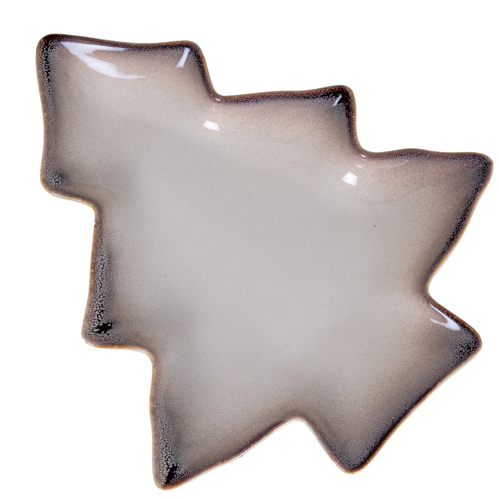 Overhead view of a tree-shaped dish with stepped branches, a pale speckled centre and a dark rim edged in tan.