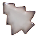 Overhead view of a tree-shaped dish with stepped branches, a pale speckled centre and a dark rim edged in tan.