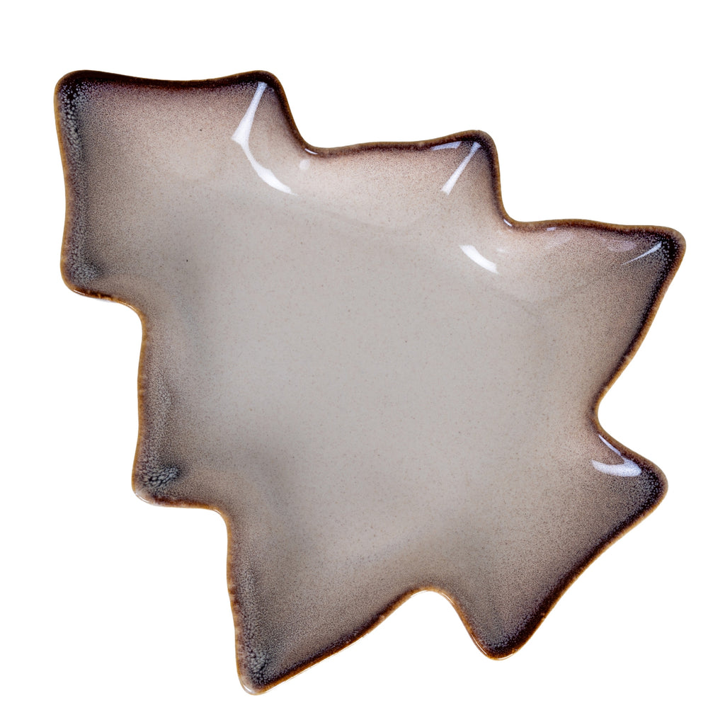 Overhead view of a tree-shaped decorative dish, with a pale speckled basin, dark stepped rim and fine tan edging.