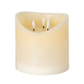 Cream LED candle on a white background, with a rounded body and deeply dipped rim surrounding three white flame-shaped elements.