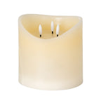 Cream LED candle on a white background, with a rounded body and deeply dipped rim surrounding three white flame-shaped elements.