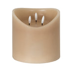 Taupe LED candle on a white background, showing its rounded body, dipped front rim and three white flame-shaped elements in the recessed top.