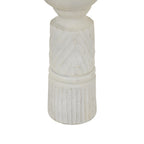 Detail of diagonal grooves above rounded dividing bands and a vertically fluted base, with darker markings showing through the whitewashed finish.