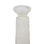 Close view of the candle holder's recessed circular top and curved neck above diagonal relief bands in a pale finish.