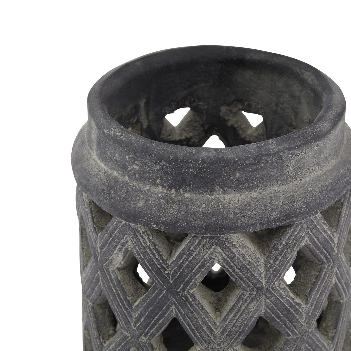 Close view of the lantern's open top and rounded rim, showing pale mottling across the dark grey surface and the upper diamond openings.