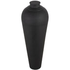 Charcoal-black lidded vase viewed slightly from above, showing the dimpled cap, rounded shoulders and long tapered body.