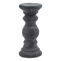 Dark grey candle holder on a white background, showing its shallow round dish, curved ringed stem and stepped circular foot.