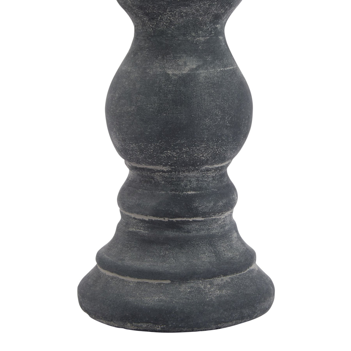 Detail of the candle holder's rounded lower stem and stepped foot, showing pale speckling and lighter lines across the dark grey ring details.