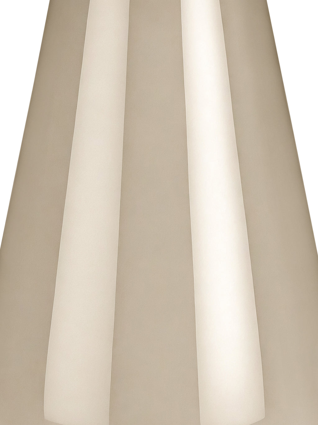 Tight detail of the beige lamp base showing elongated reflections across its smooth curved surface.
