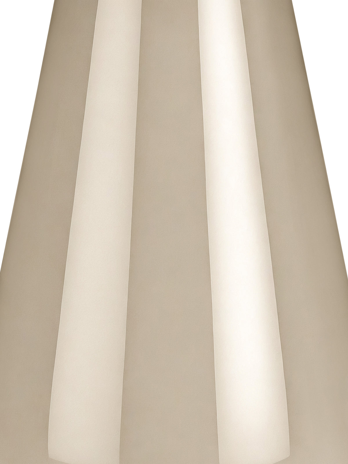 Tight detail of the beige lamp base showing elongated reflections across its smooth curved surface.