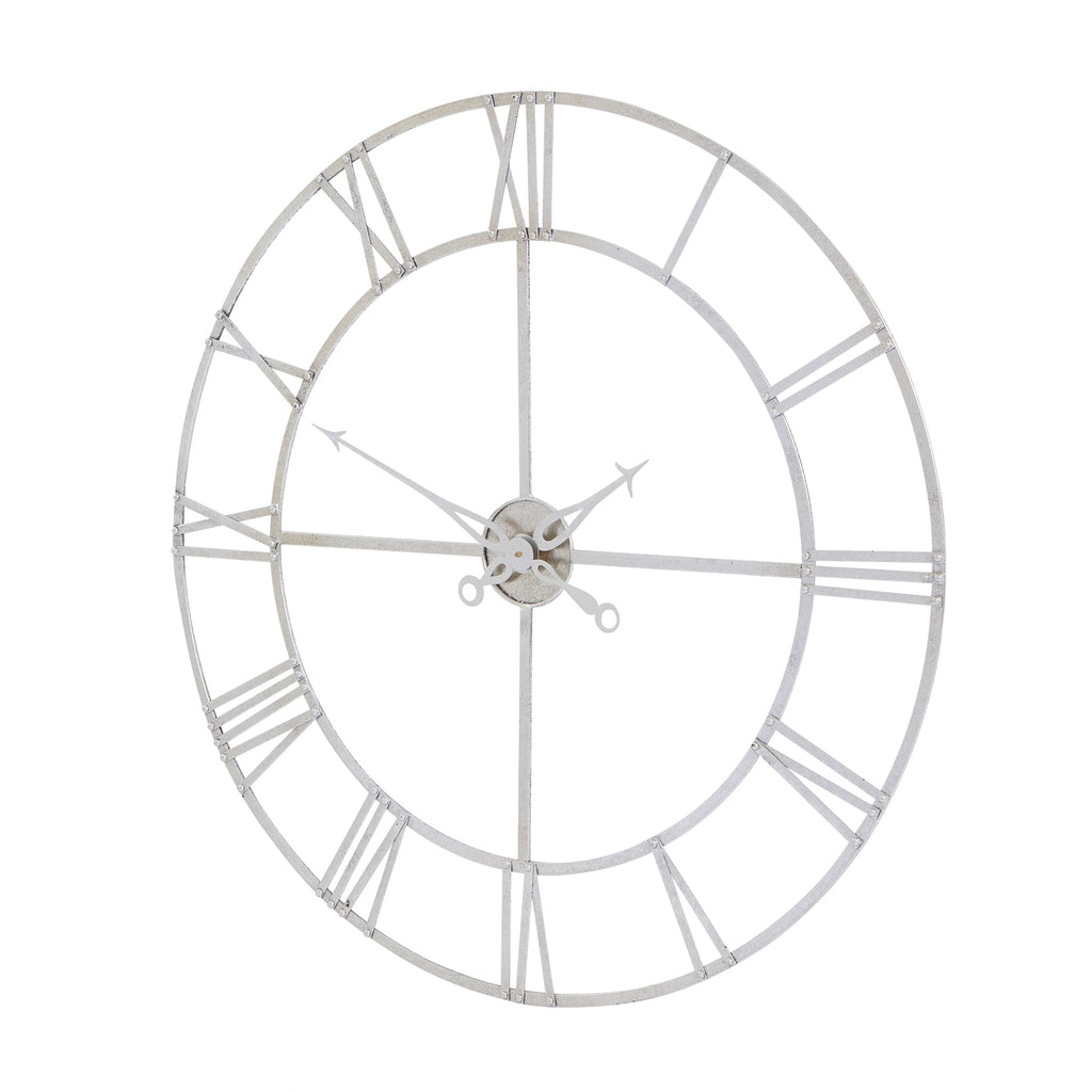 Angled view of the silver-toned clock showing its circular rails, flat numeral bars and cross-shaped centre bracing.